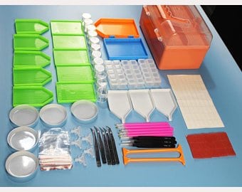 Diamond painting tools: a light pad, drill storage boxes, trays and applicator pens